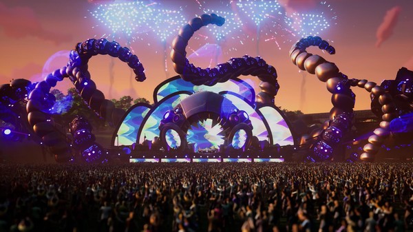 Festival stage with giant octopus tentacle structures at sunset