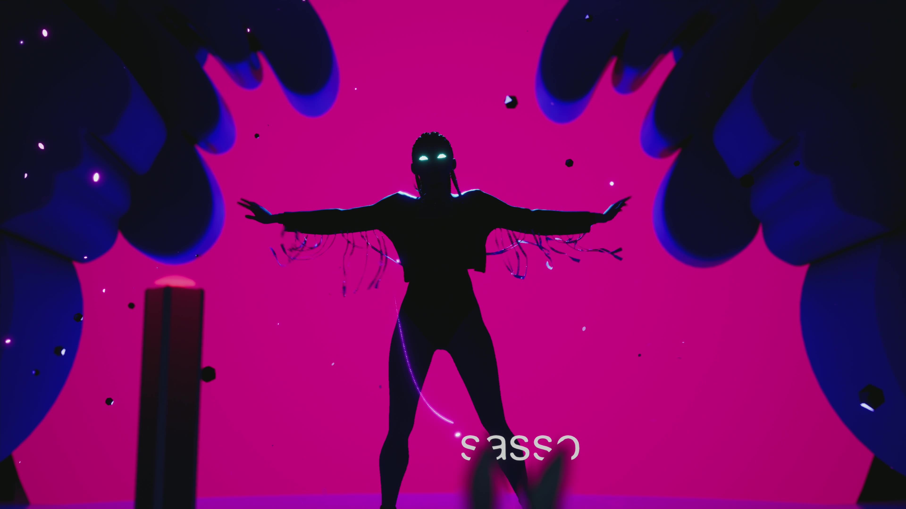 Silhouetted performer with arms spread against vibrant magenta background and blue flames